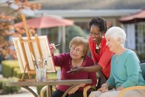 elderly women painting 