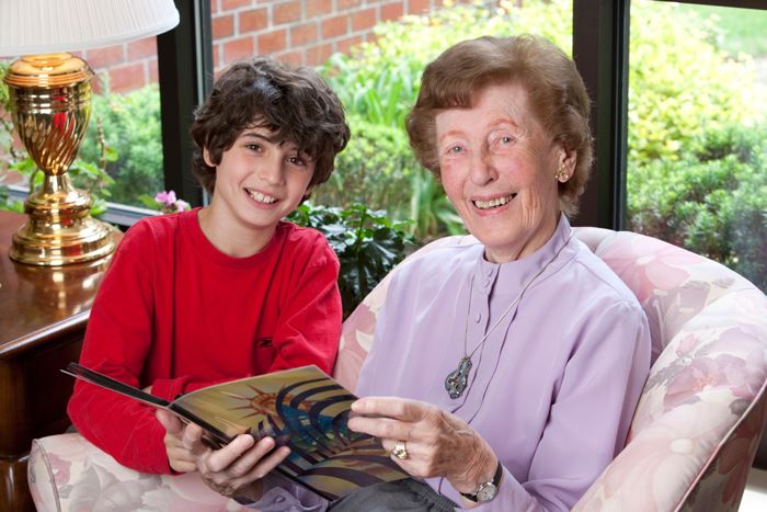 elder woman and young boy