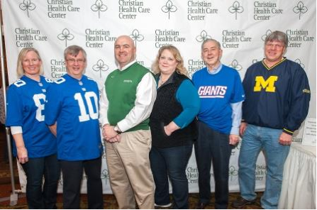 group of people in sports jerseys 